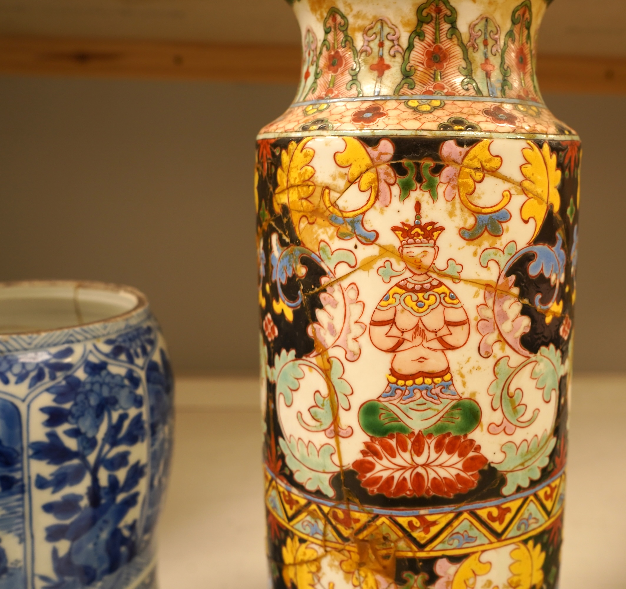 A Chinese Kangxi blue and white vase (cut down gu vase), 26cm high and a Chinese Bencharong famille rose vase